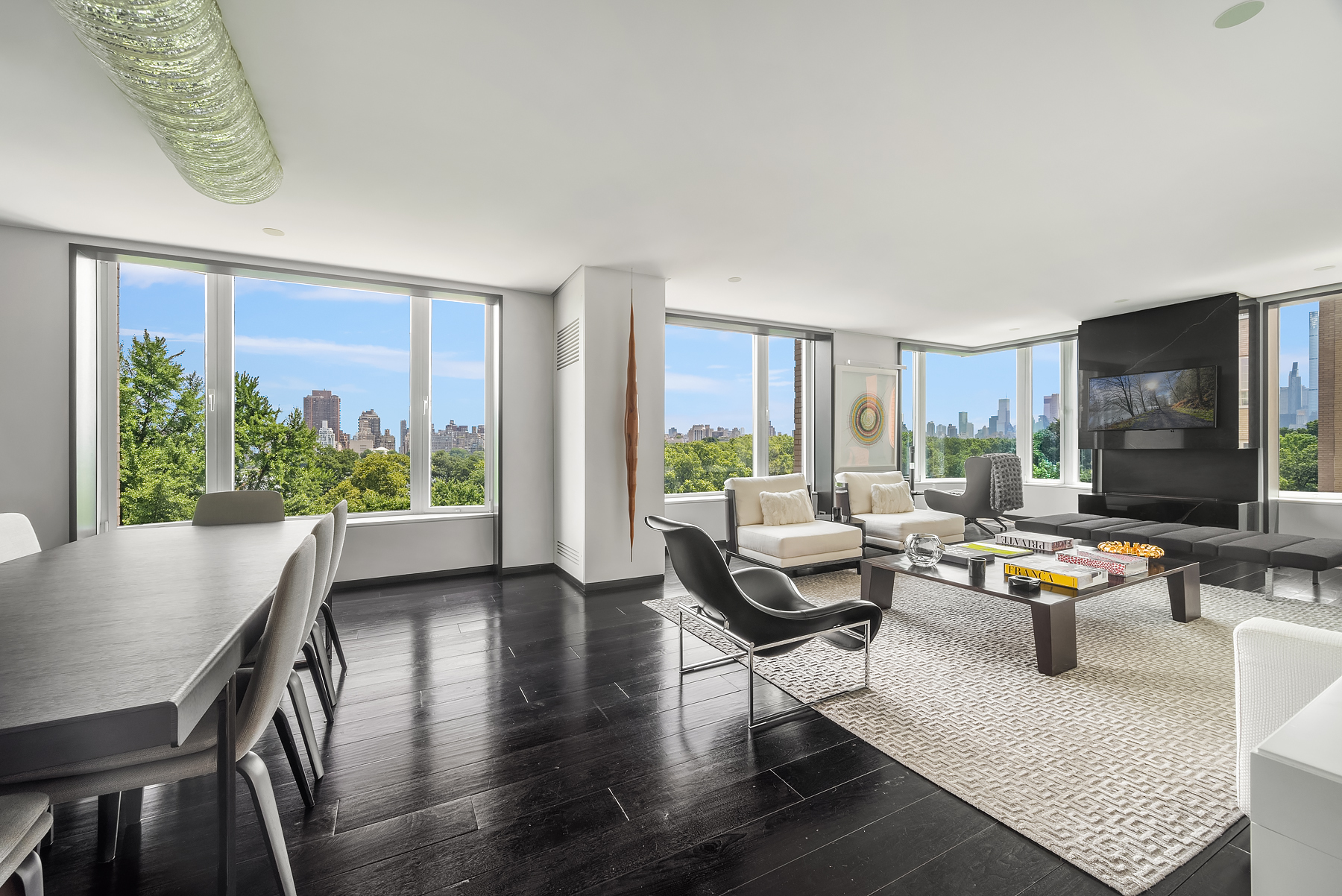 279 Central Park West, Unit 8B Manhattan, NY 10024 - Photo 2 of 15 a living room with furniture and a flat screen tv