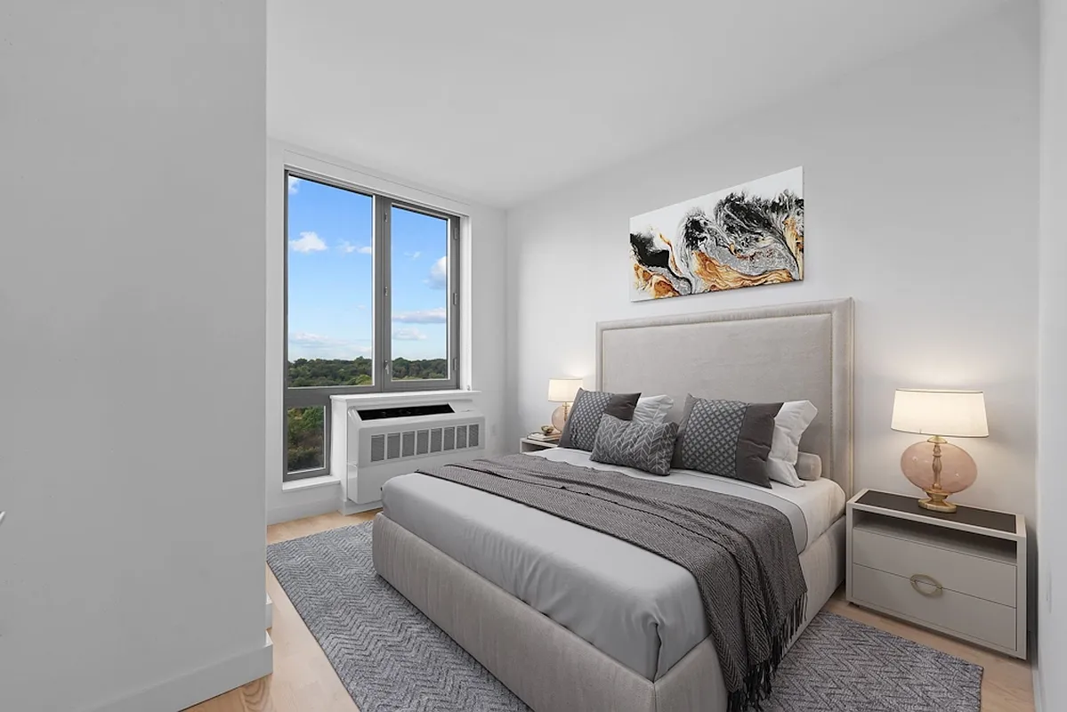 626 Flatbush Avenue, Unit 20J Brooklyn, NY 11225 - Photo 4 of 13 a bedroom with a bed and a window