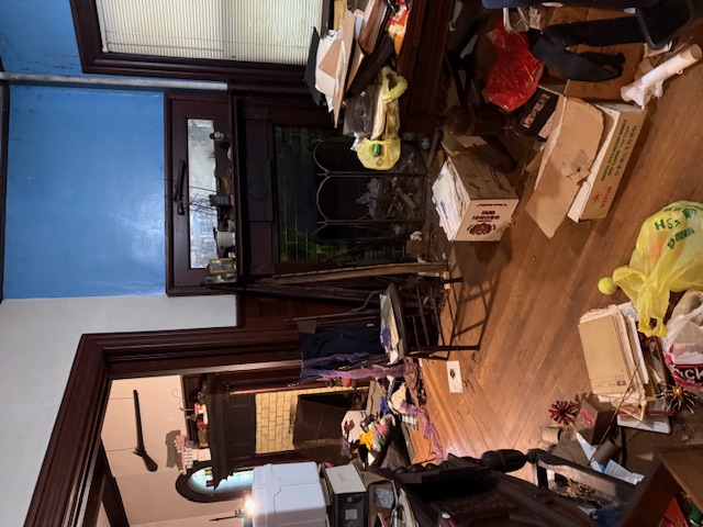 202 Marlborough Road Brooklyn, NY 11226 - Photo 9 of 14 a living room with furniture and a fireplace