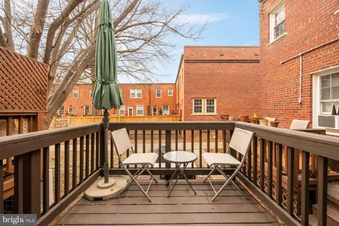 a view of a chairs on the roof deck