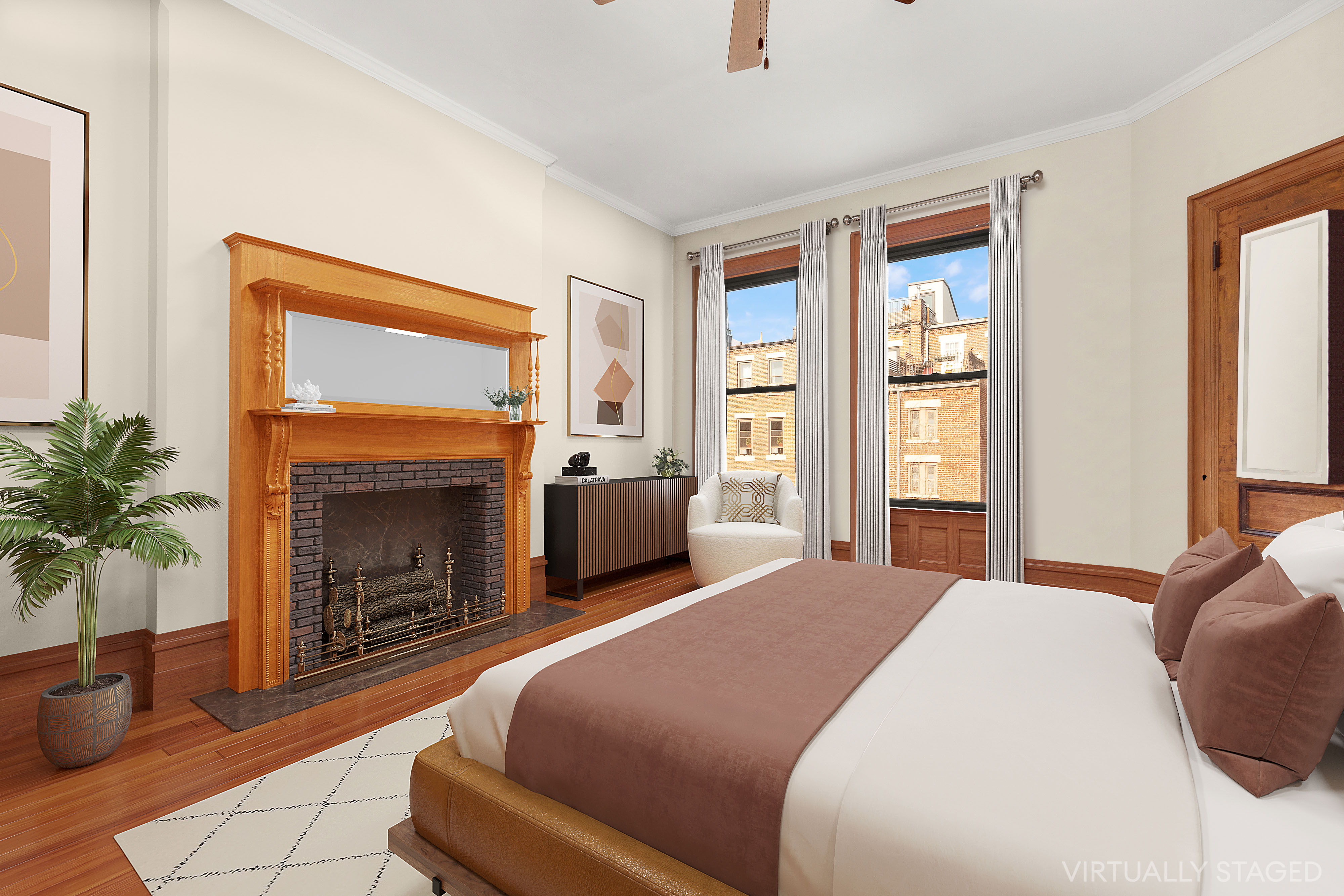 117 West 120th Street Manhattan, NY 10027 - Photo 24 of 31 a bedroom with a bed and a fireplace