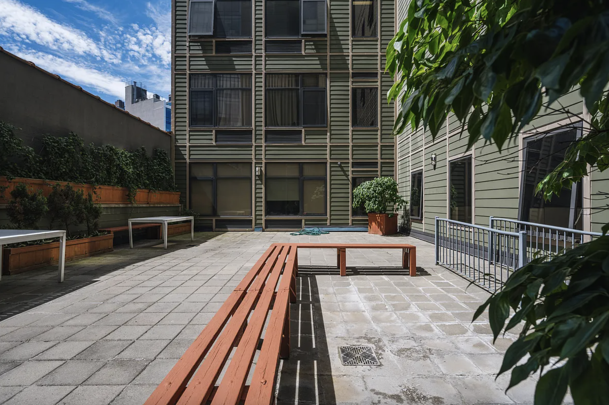 42-37 27th Street, Unit 8B Queens, NY 11101 - Photo 10 of 11 a view of house with swimming pool and sitting area