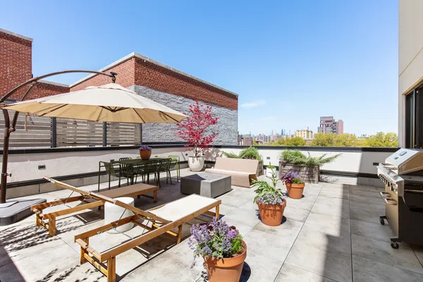an outdoor space with furniture