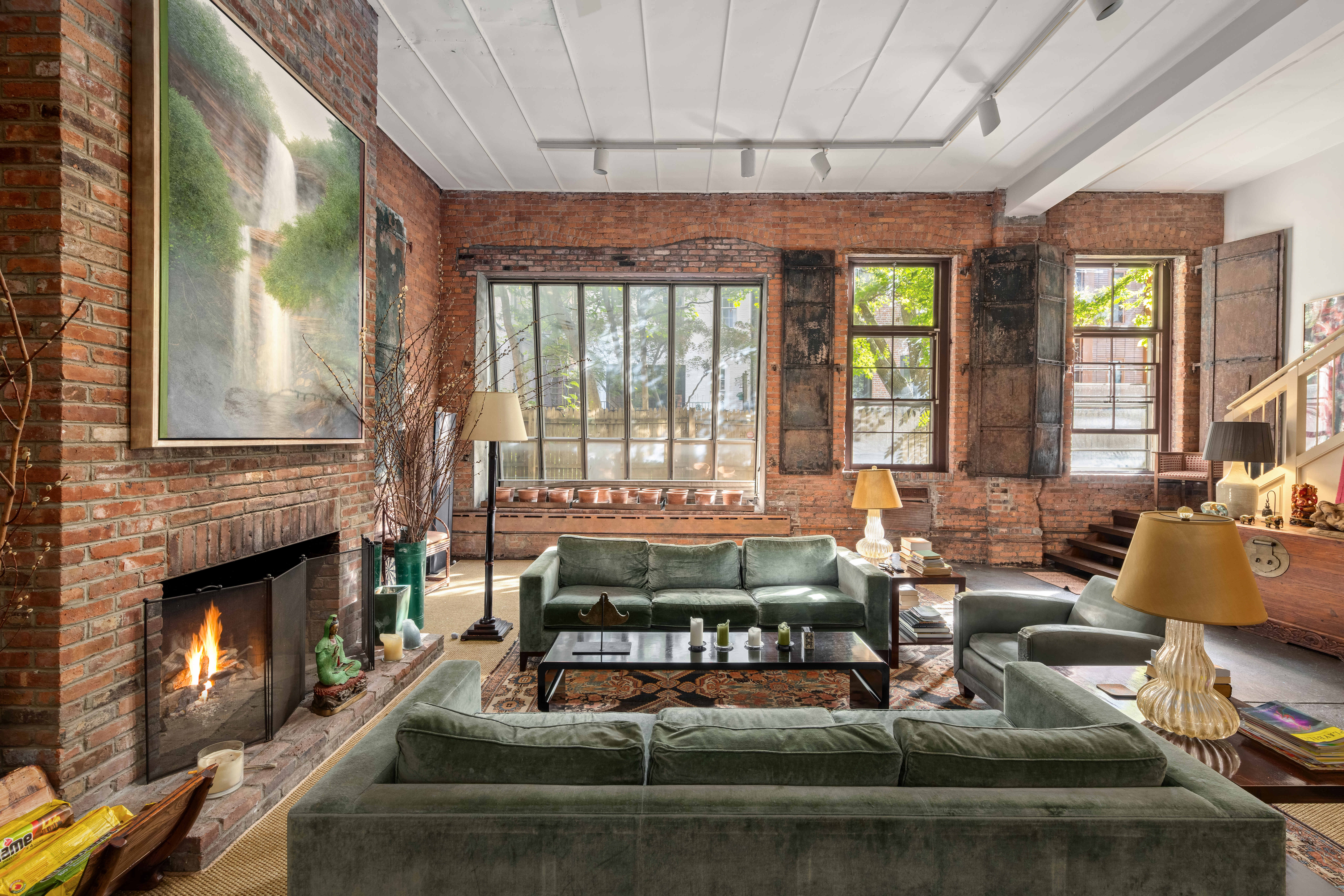 72 Horatio Street, Unit 1S Manhattan, NY 10014 - Photo 4 of 15 a living room with fireplace furniture and a fireplace