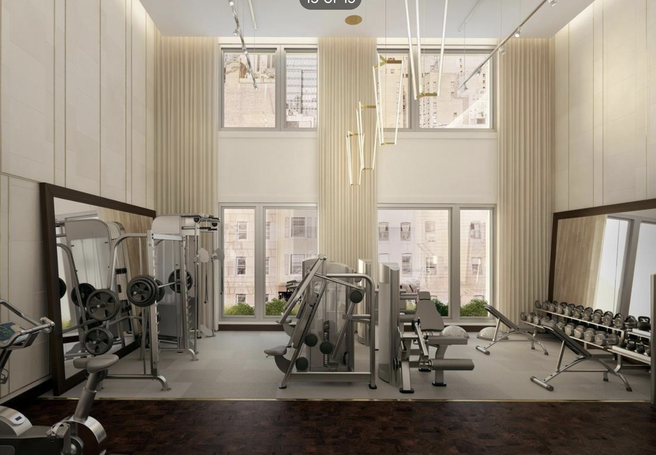 301 East 50th Street, Unit 17B Manhattan, NY 10022 - Photo 9 of 12 a view of a room with gym equipment