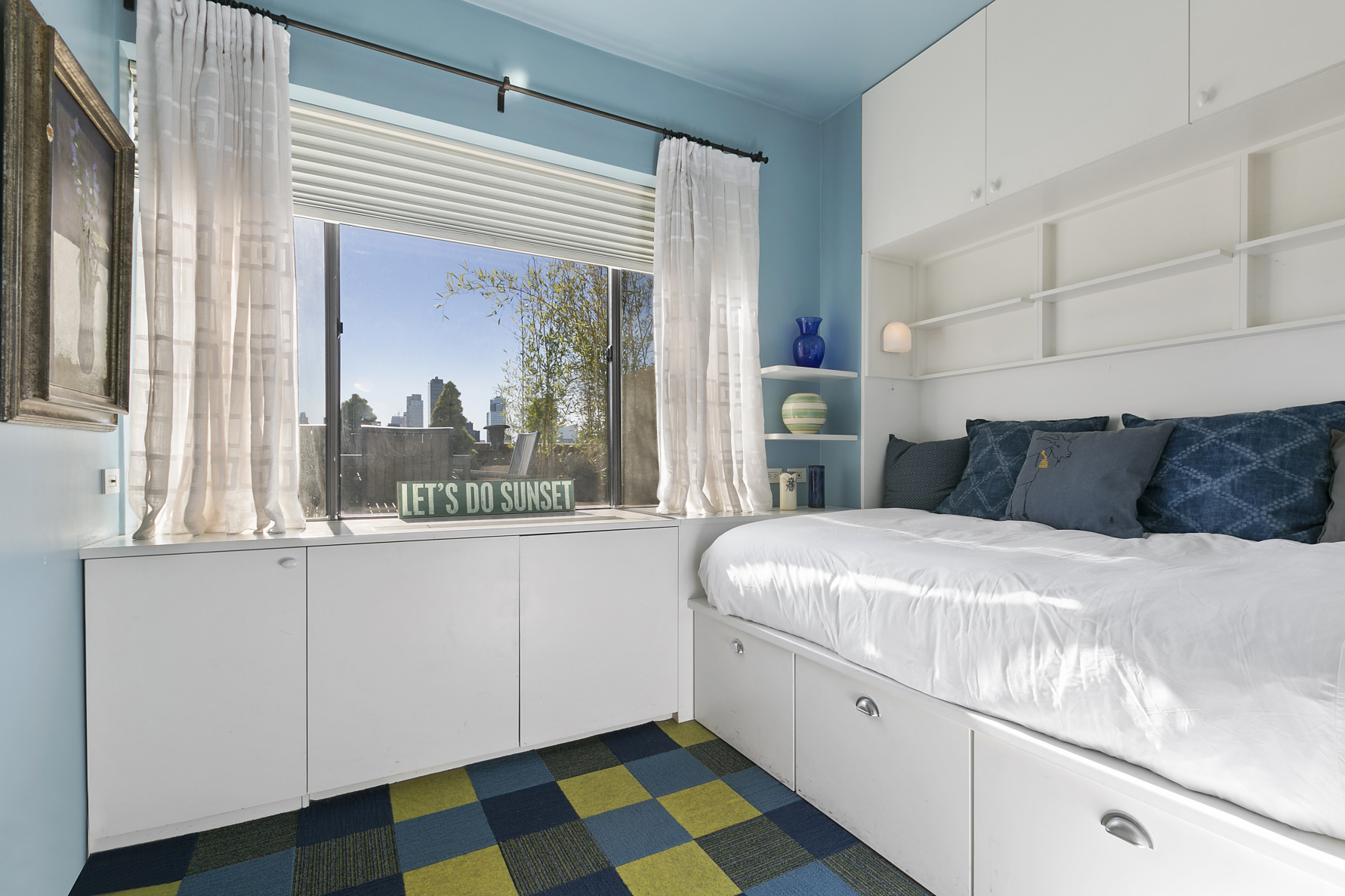 130 West 79th Street, Unit 17A Manhattan, NY 10024 - Photo 7 of 15 a bedroom with a bed and a window