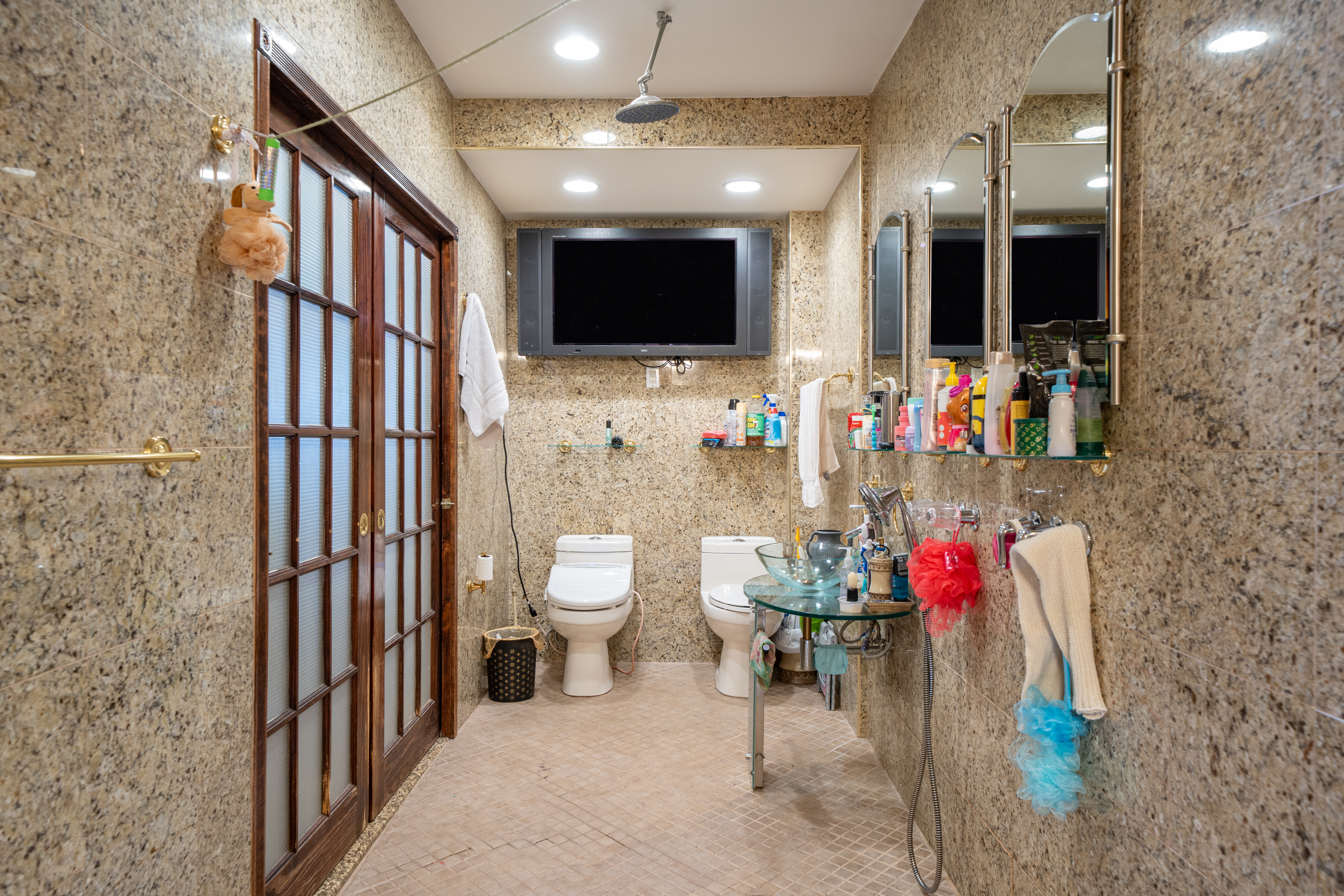 415 84th Street Brooklyn, NY 11209 - Photo 8 of 17 a bathroom with a toilet sink and mirror