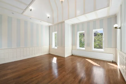 an empty room with windows