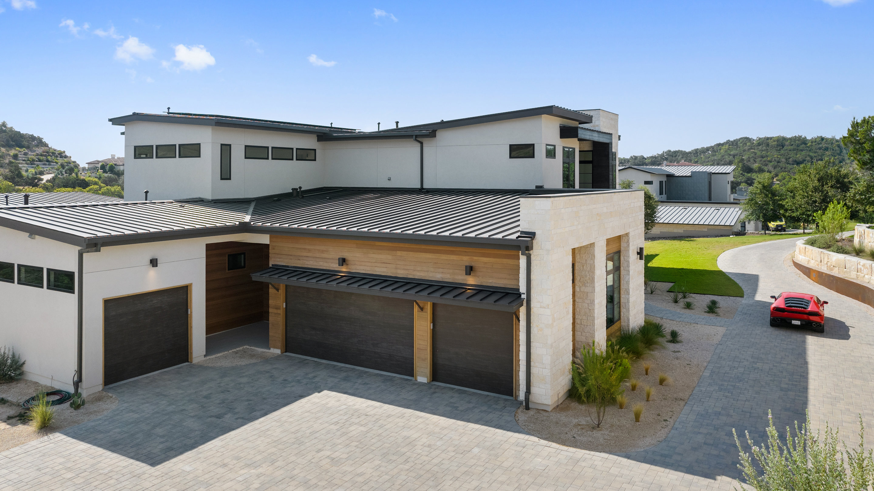 1905 Hallam Drive Austin, TX 78746 - Photo 3 of 39 a kitchen with a stove and a kitchen