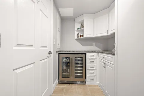 a bedroom with bed and a window