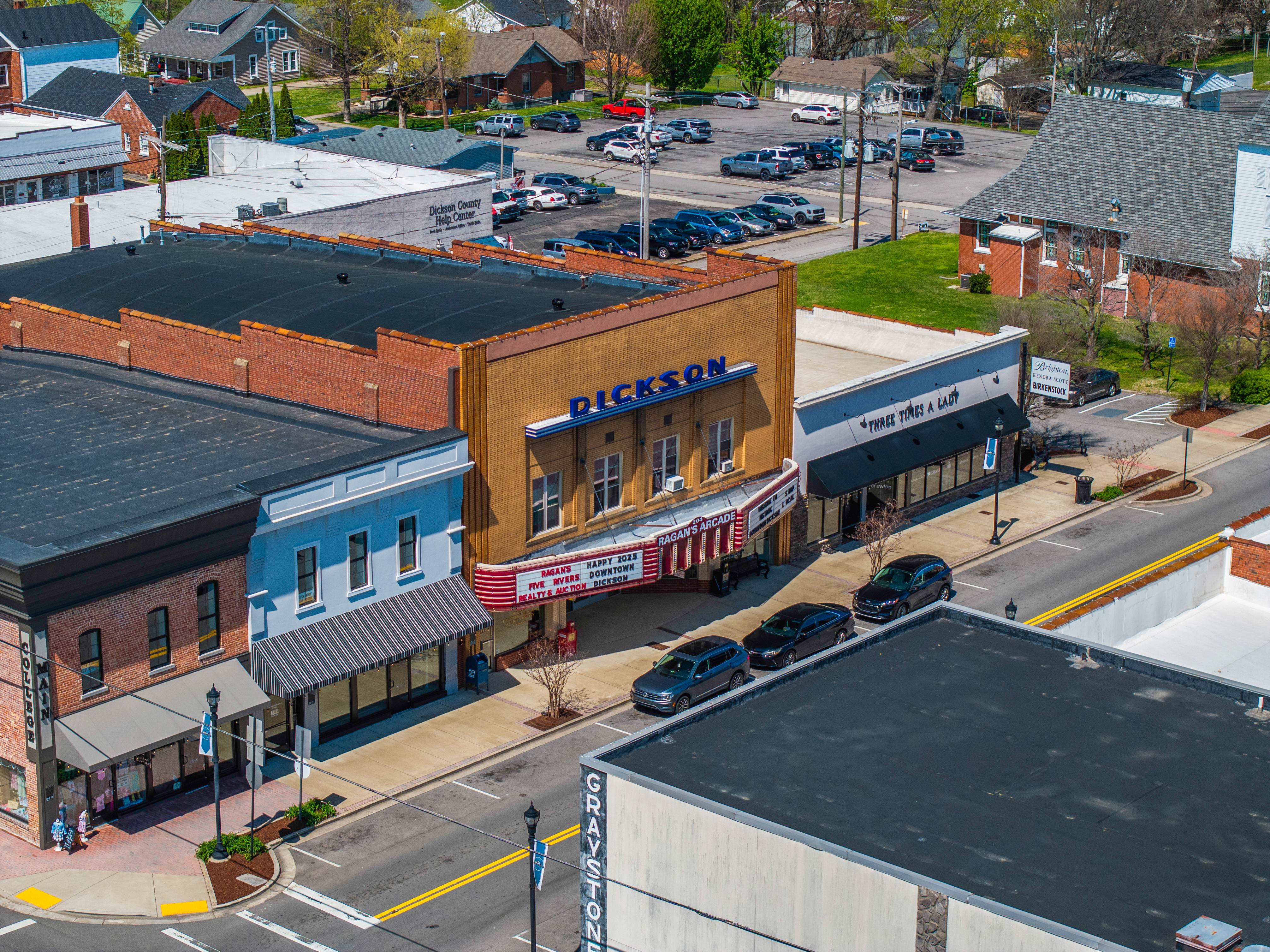 Henslee Dr / Spring St Dickson, TN 37055 - Photo 15 of 16 a street view with tall buildings and cars park