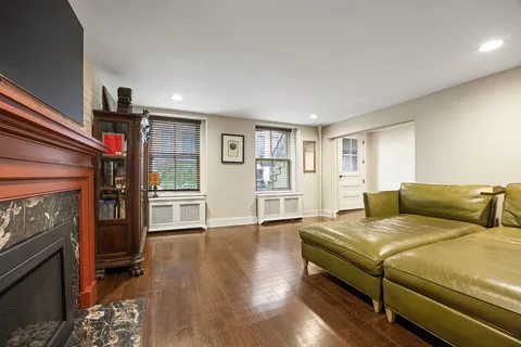 a bed room with a bed and a television