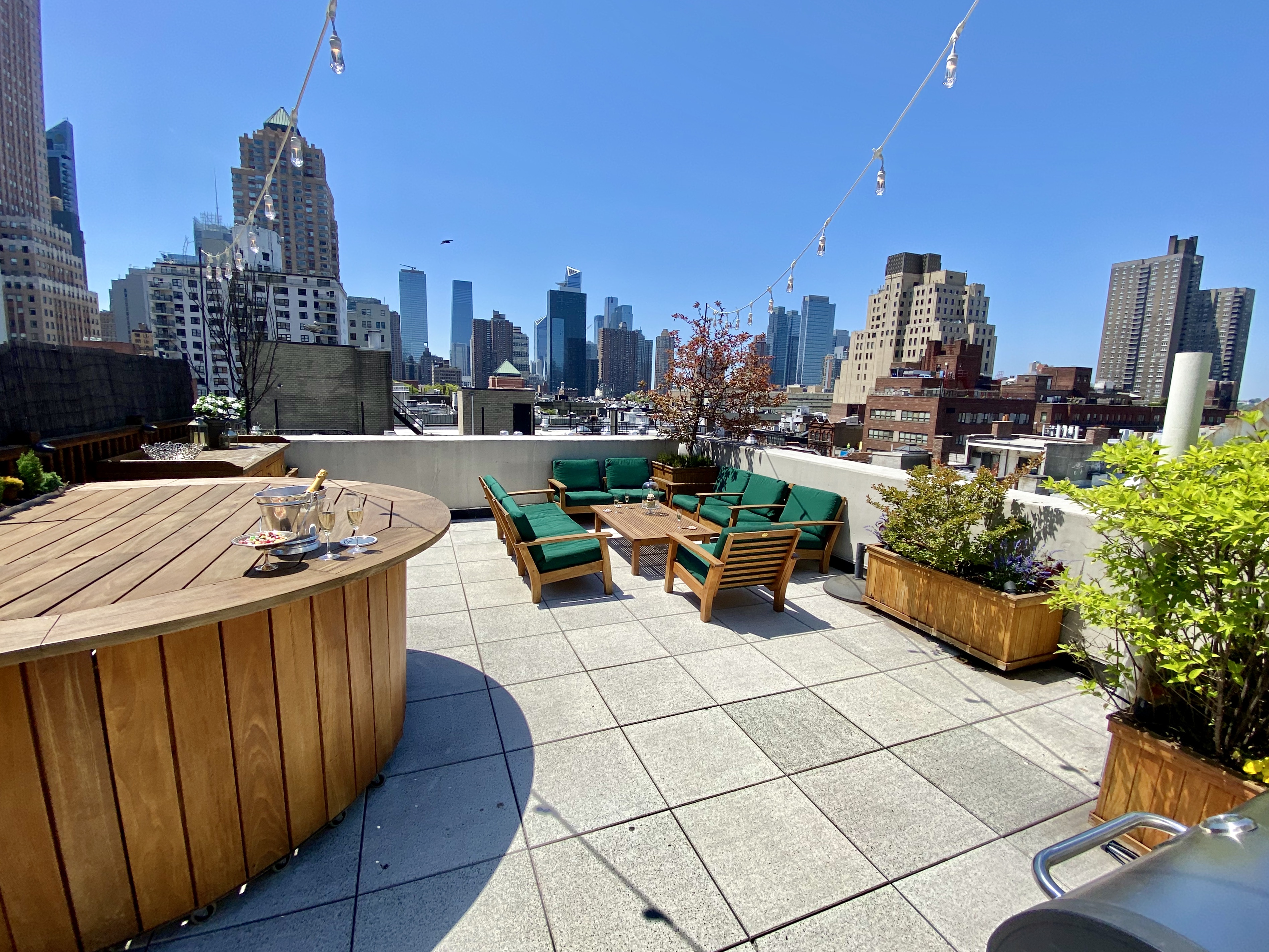 350 West 53rd Street, Unit PHB Manhattan, NY 10019 - Photo 23 of 34 a view of a city with tall buildings