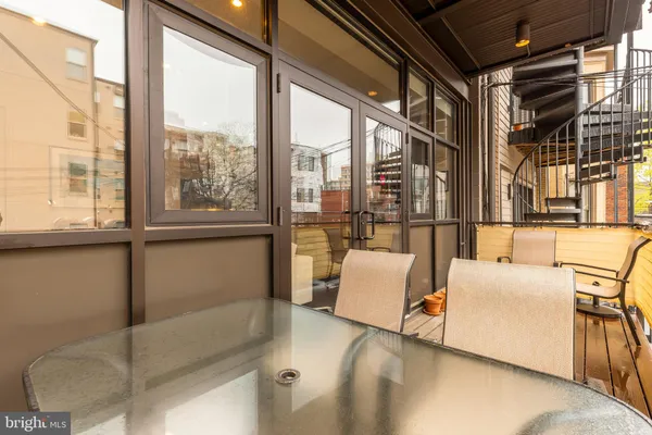 a bathroom with a sink mirror vanity and toilet