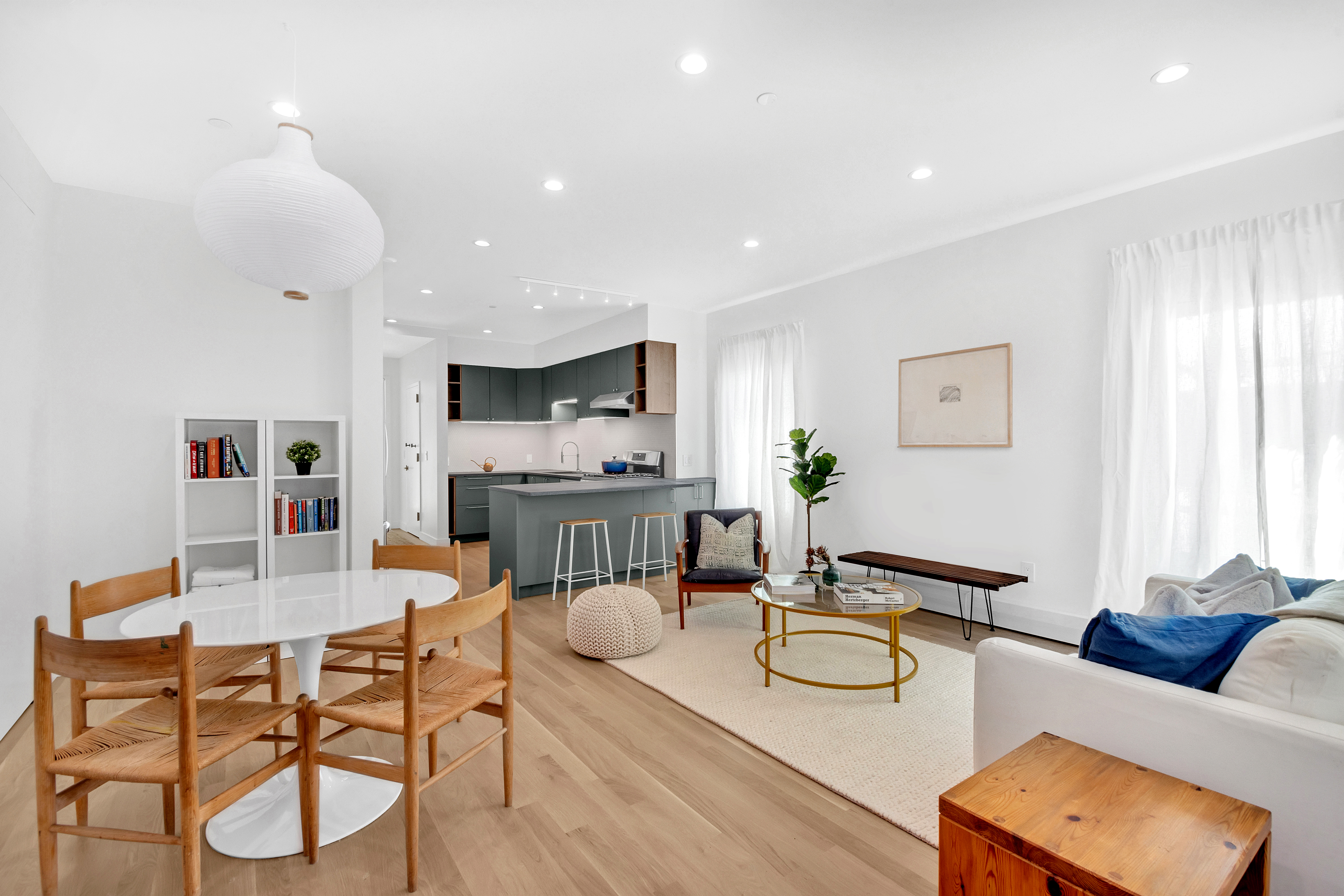 86 Baltic Street, Unit 1 Brooklyn, NY 11201 - Photo 2 of 14 a dining room with furniture a window and kitchen view