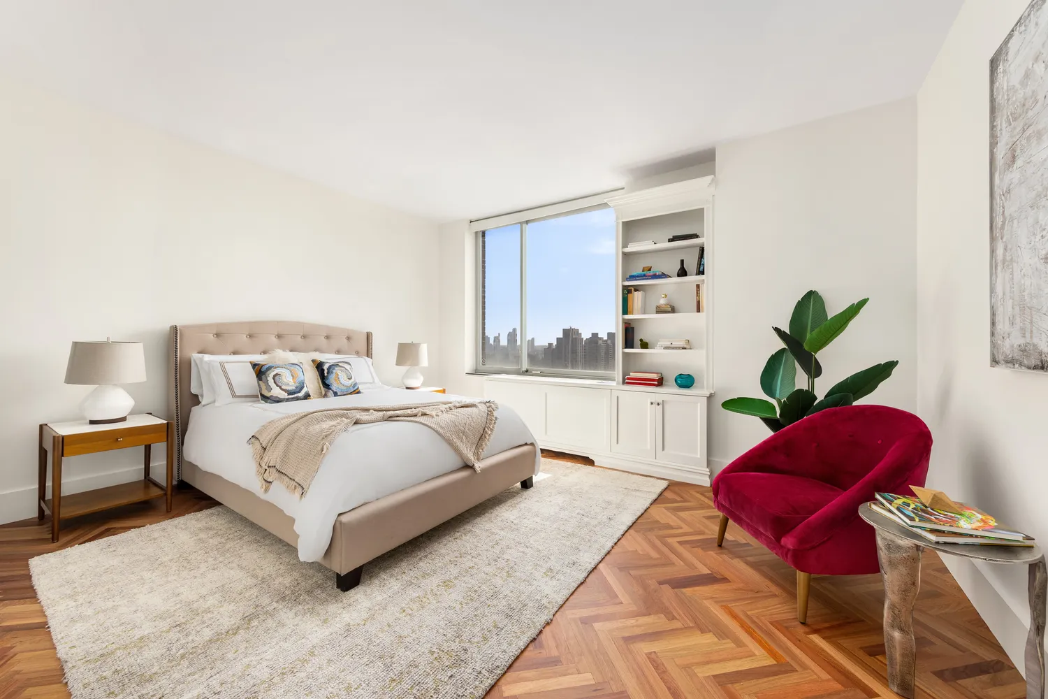 a bedroom with a large bed and a couch