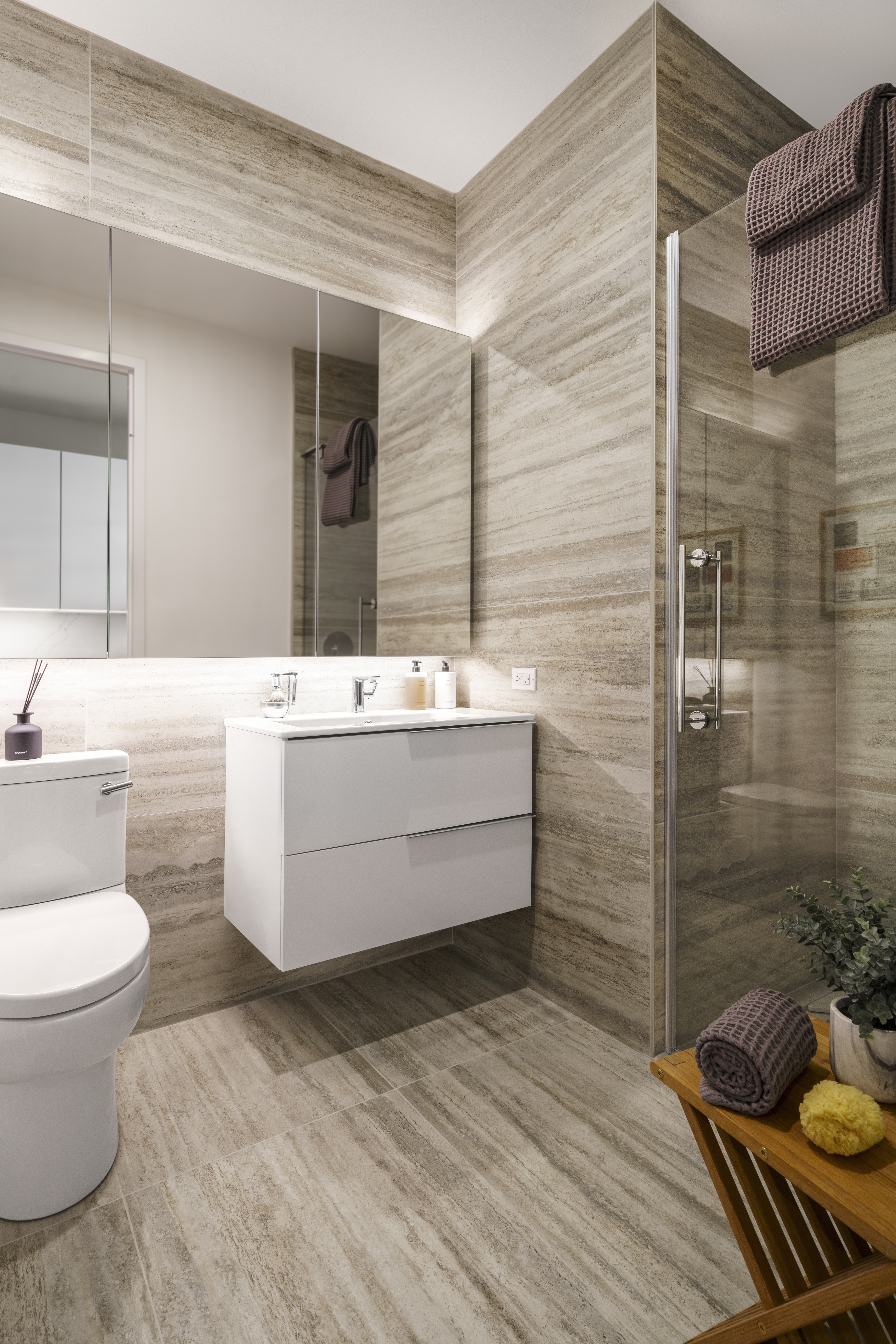 55 Broad Street, Unit 3506 Manhattan, NY 10004 - Photo 4 of 12 a bathroom with a sink toilet and shower