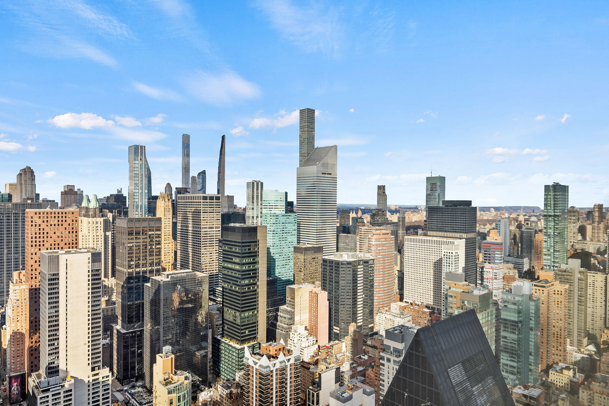 845 United Nations Plaza, Unit 63D Manhattan, NY 10017 - Photo 15 of 16 a view of a city with tall buildings