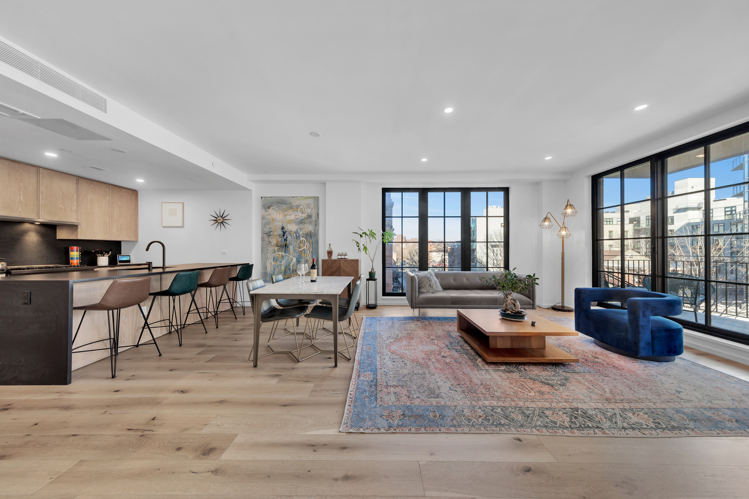 532 Clinton Avenue, Unit 5A Brooklyn, NY 11238 - Photo 1 of 11 a living room with furniture and a table