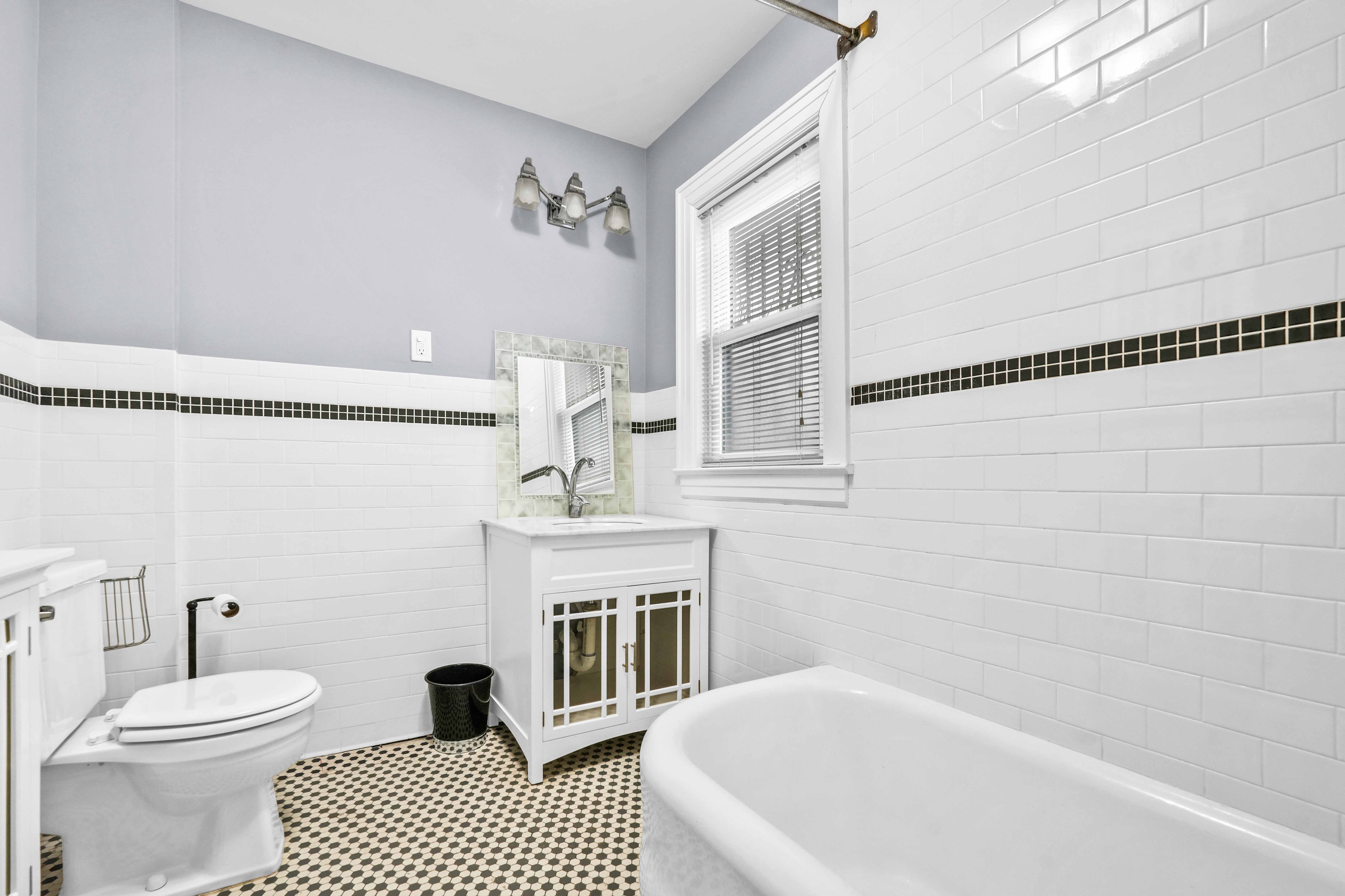 188-22 Lewiston Avenue, Unit 1 Queens, NY 11412 - Photo 14 of 17 a bathroom with a sink toilet and shower