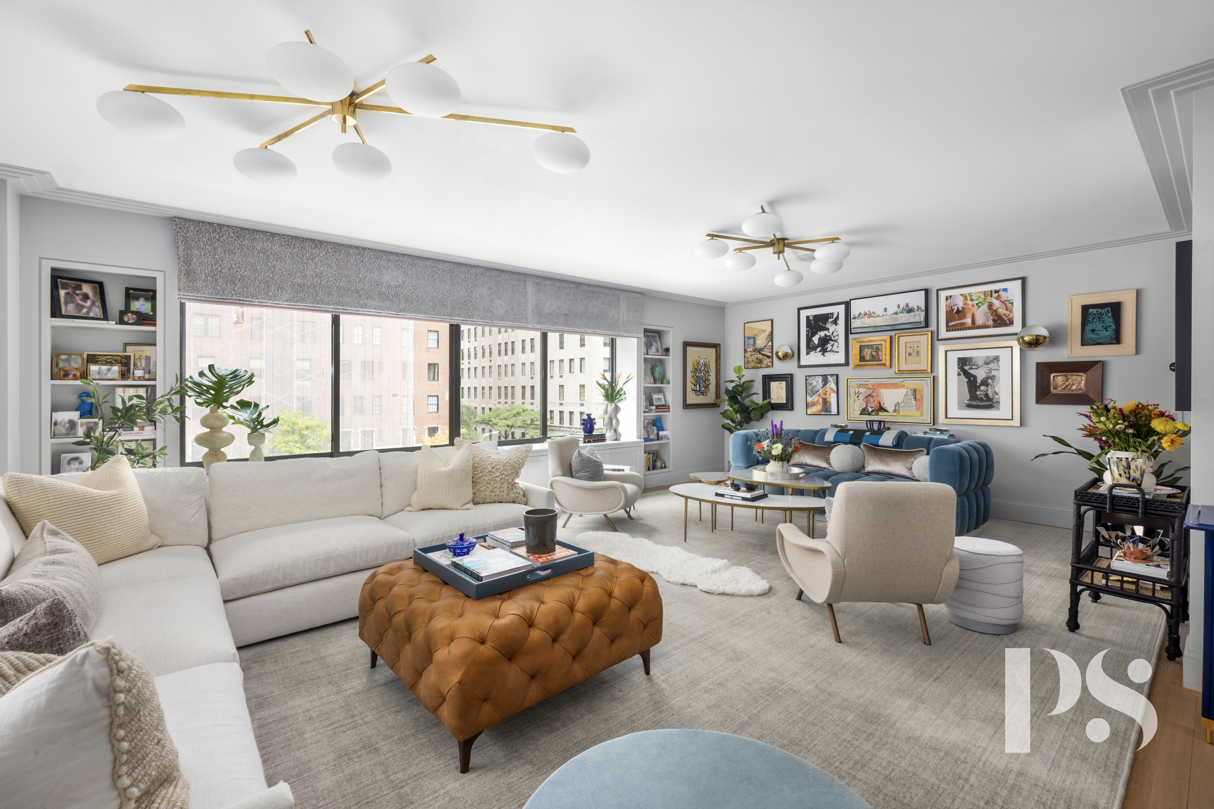 733 Park Avenue, Unit 4 Manhattan, NY 10021 - Photo 3 of 29 a living room with furniture and a large window