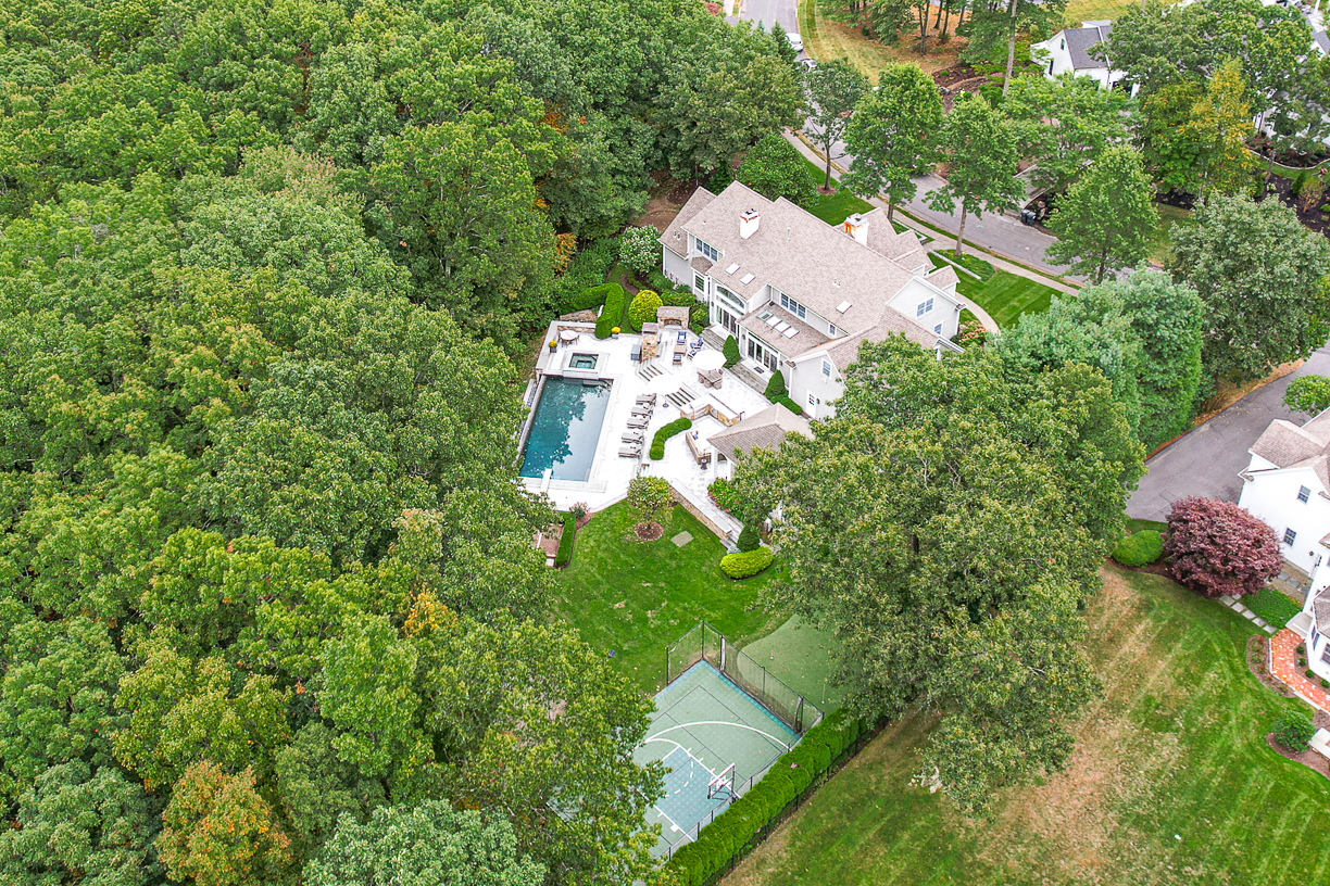 165 Bridle Trail Road Needham, MA 02492 - Photo 20 of 21 an aerial view of a house with a yard