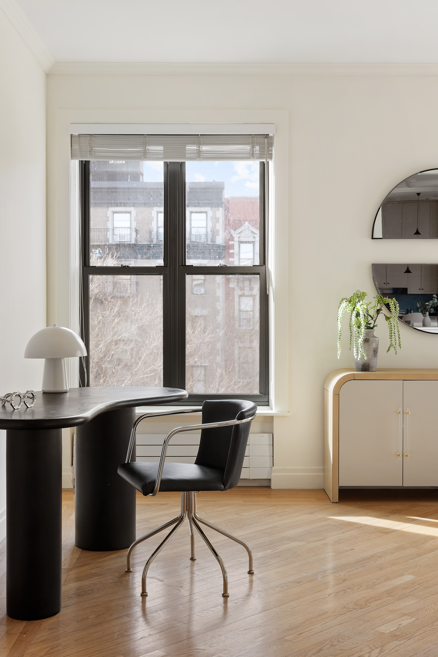 1845 Adam Clayton Powell Jr Boulevard, Unit 5C Manhattan, NY 10026 - Photo 6 of 17 a living room with furniture and window