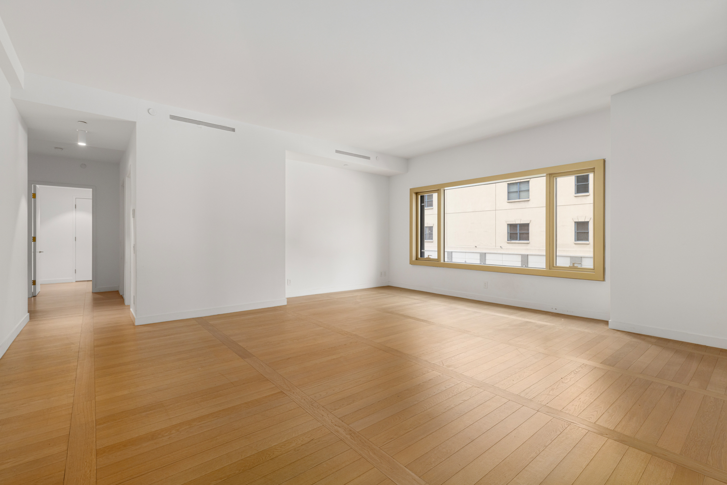 30 Warren Street, Unit 2A Manhattan, NY 10007 - Photo 2 of 10 a view of an empty room with a window