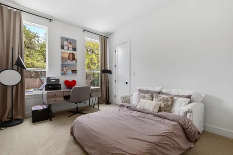 a bathroom with a toilet a sink and a bathtub