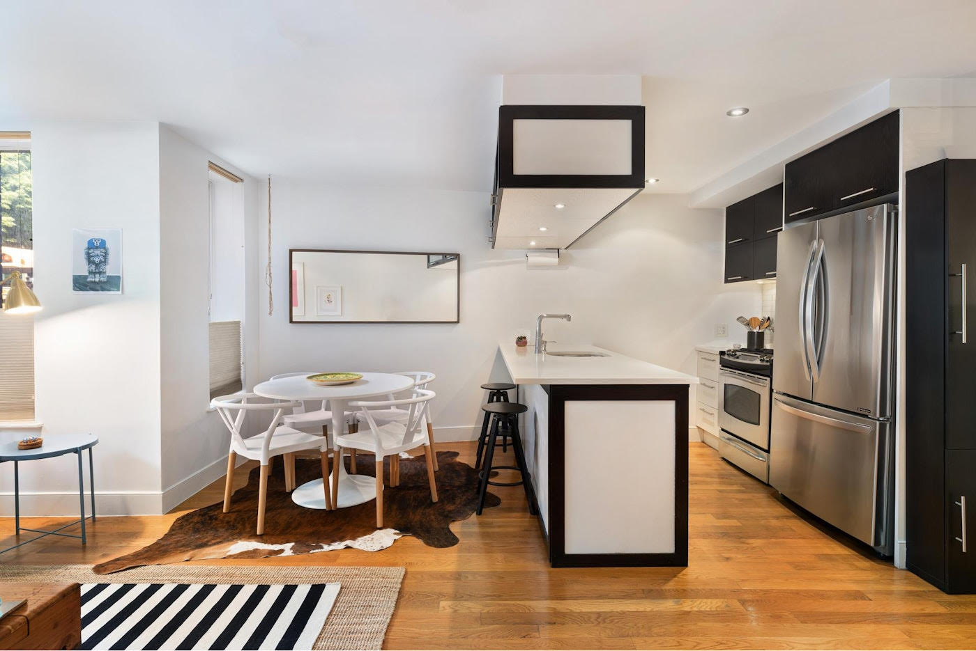 662 Bergen Street, Unit 1A Brooklyn, NY 11238 - Photo 2 of 9 a kitchen with stainless steel appliances granite countertop a refrigerator and a stove top oven