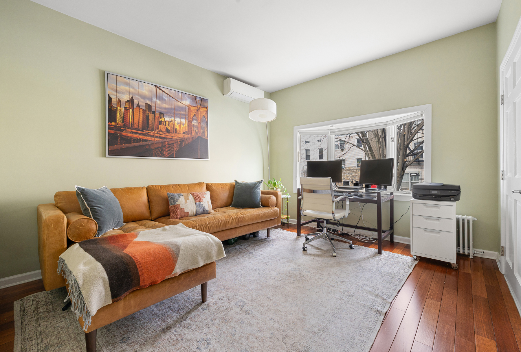202 22nd Street Brooklyn, NY 11232 - Photo 13 of 28 a living room with furniture and a flat screen tv