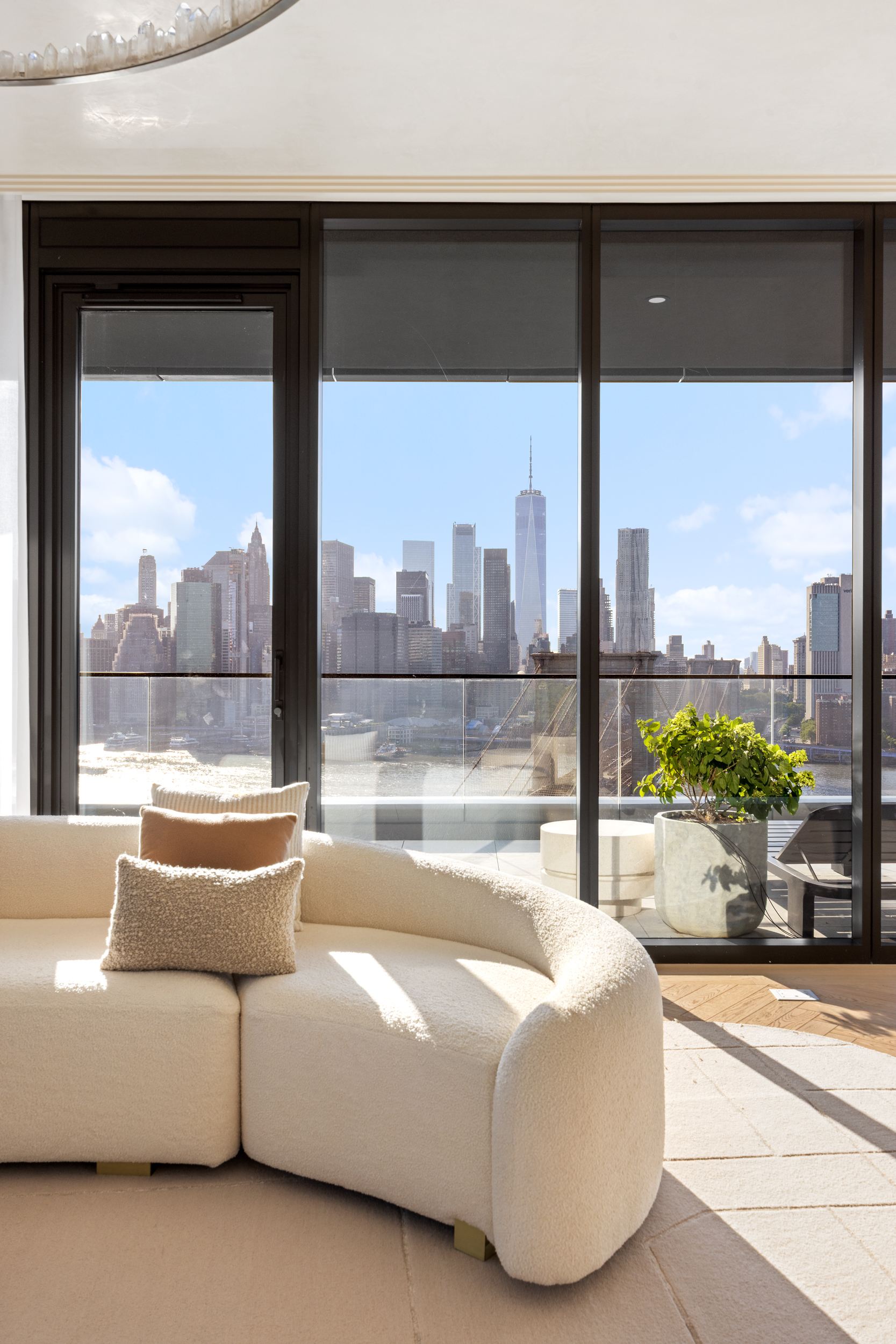 30 Front Street, Unit 25A Brooklyn, NY 11201 - Photo 7 of 45 a living room with a large window and a couch