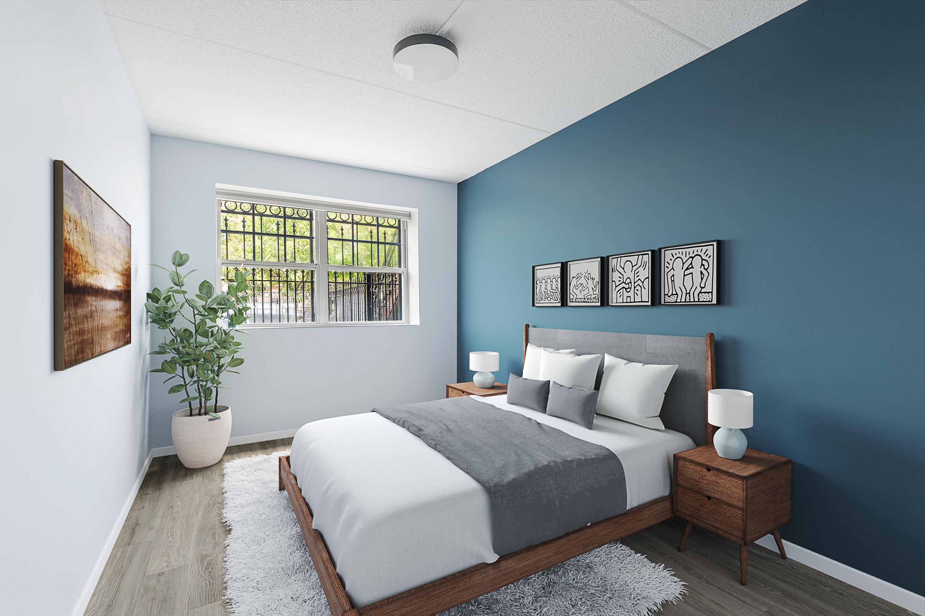 482 Central Avenue, Unit 1 Brooklyn, NY 11221 - Photo 3 of 6 a bedroom with a large bed and a potted plant