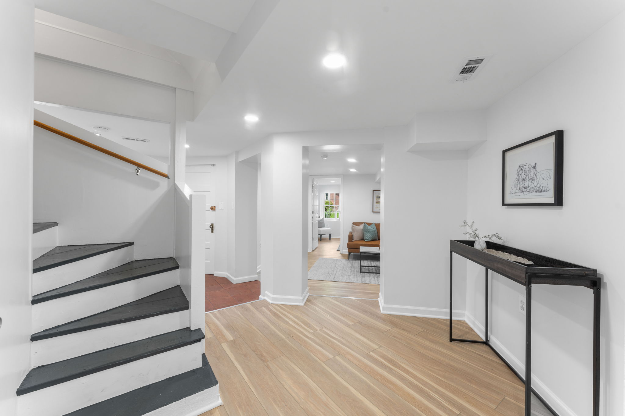 1325 Locust Road Northwest Washington, DC 20012 - Photo 39 of 56 a bedroom with a bed and wooden floor