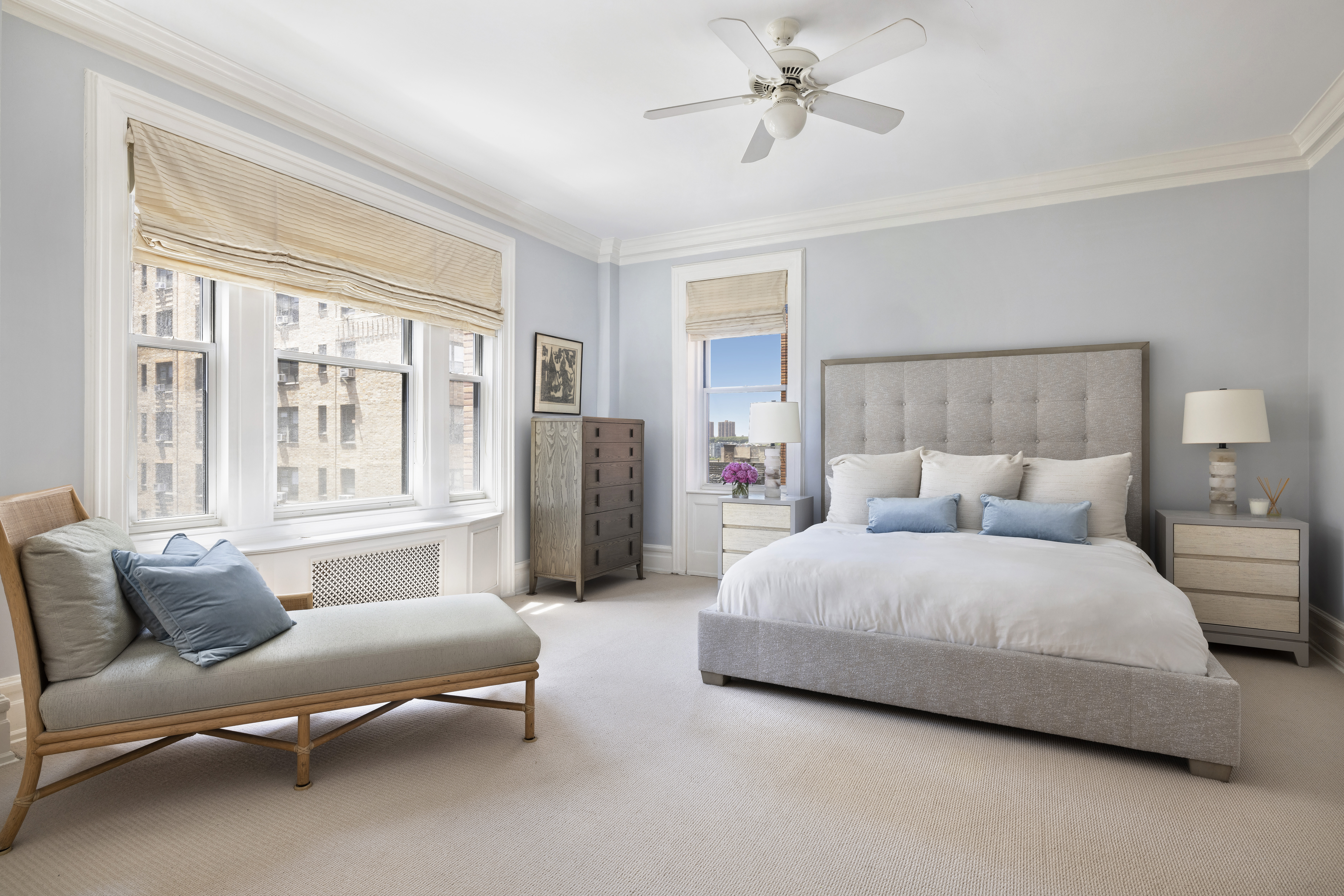 325 West End Avenue, Unit 6AB Manhattan, NY 10023 - Photo 10 of 22 a spacious bedroom with a bed and a couch