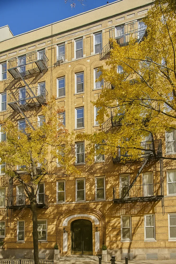a group of people walking down a street