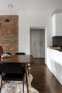 a view of a workspace with furniture