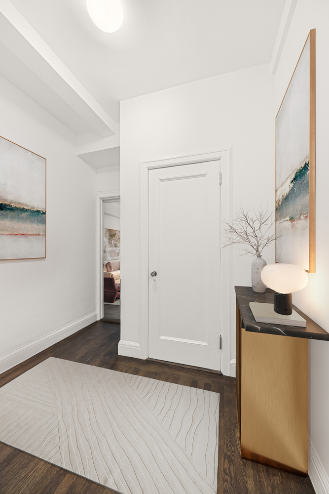 39 5th Avenue, Unit 2B Manhattan, NY 10003 - Photo 6 of 10 a view of a livingroom with wooden floor and cabinet