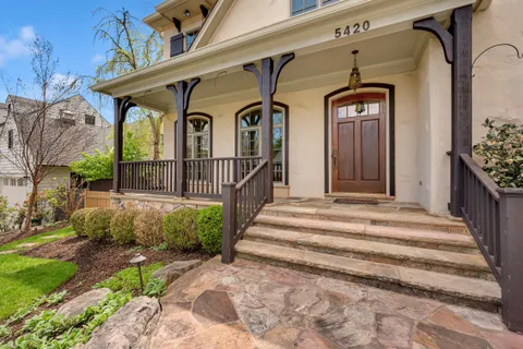 a view of a house with a small porch