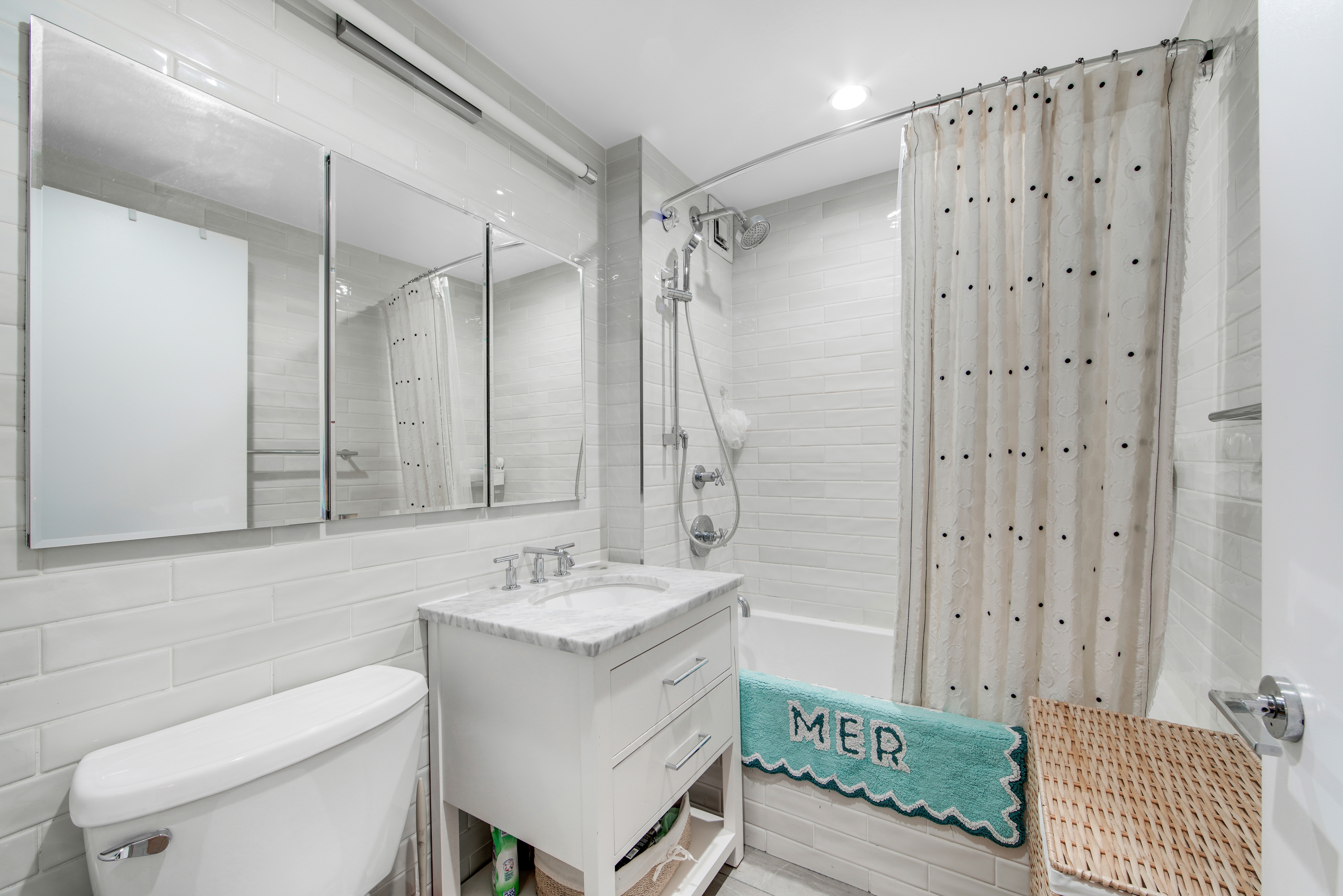 1330 5th Avenue, Unit 3F Manhattan, NY 10026 - Photo 8 of 16 a bathroom with a sink toilet a shower and a mirror