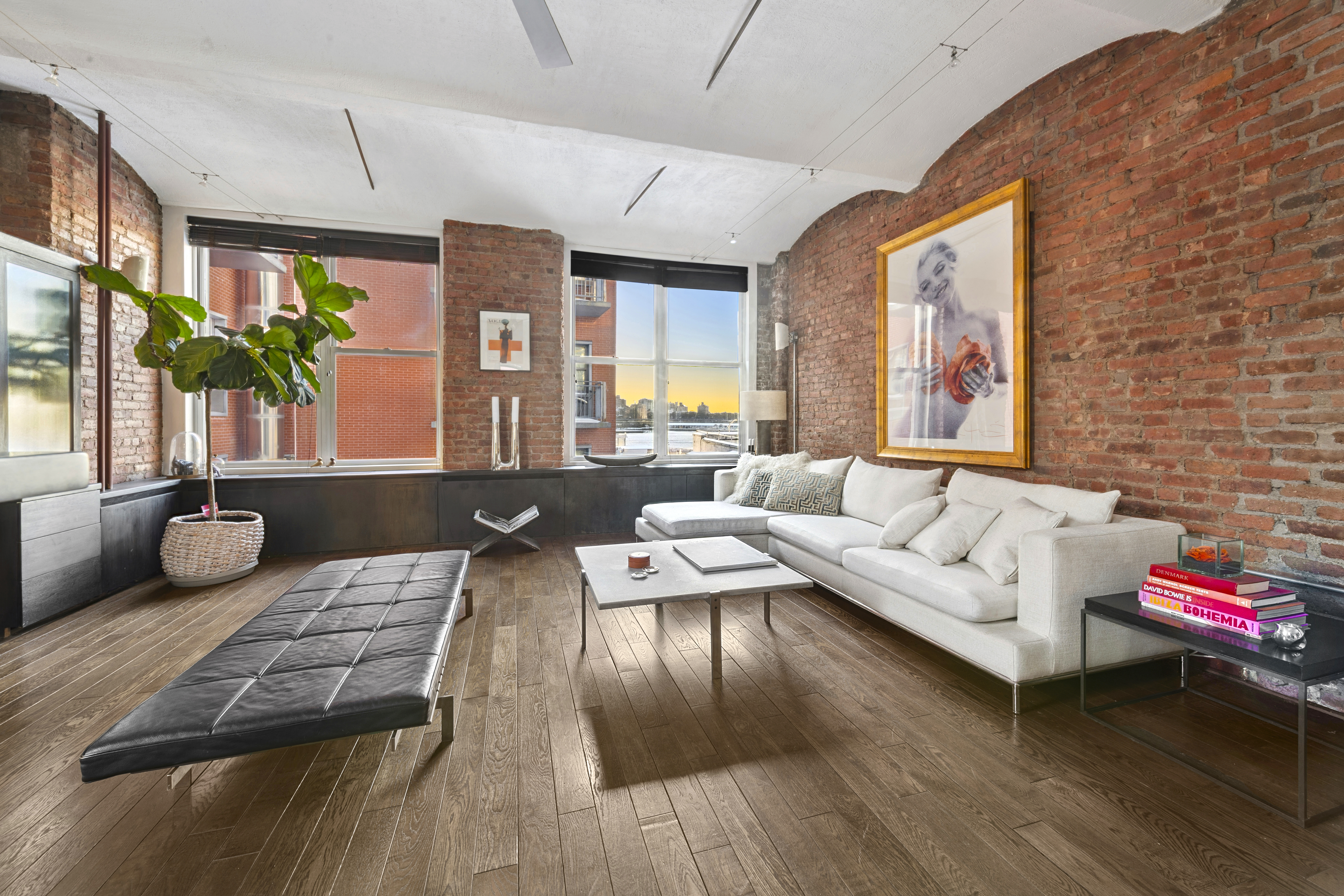 275 Water Street, Unit 5/6 New York, NY 10038 - Photo 1 of 26 a living room with furniture fireplace and wooden floor