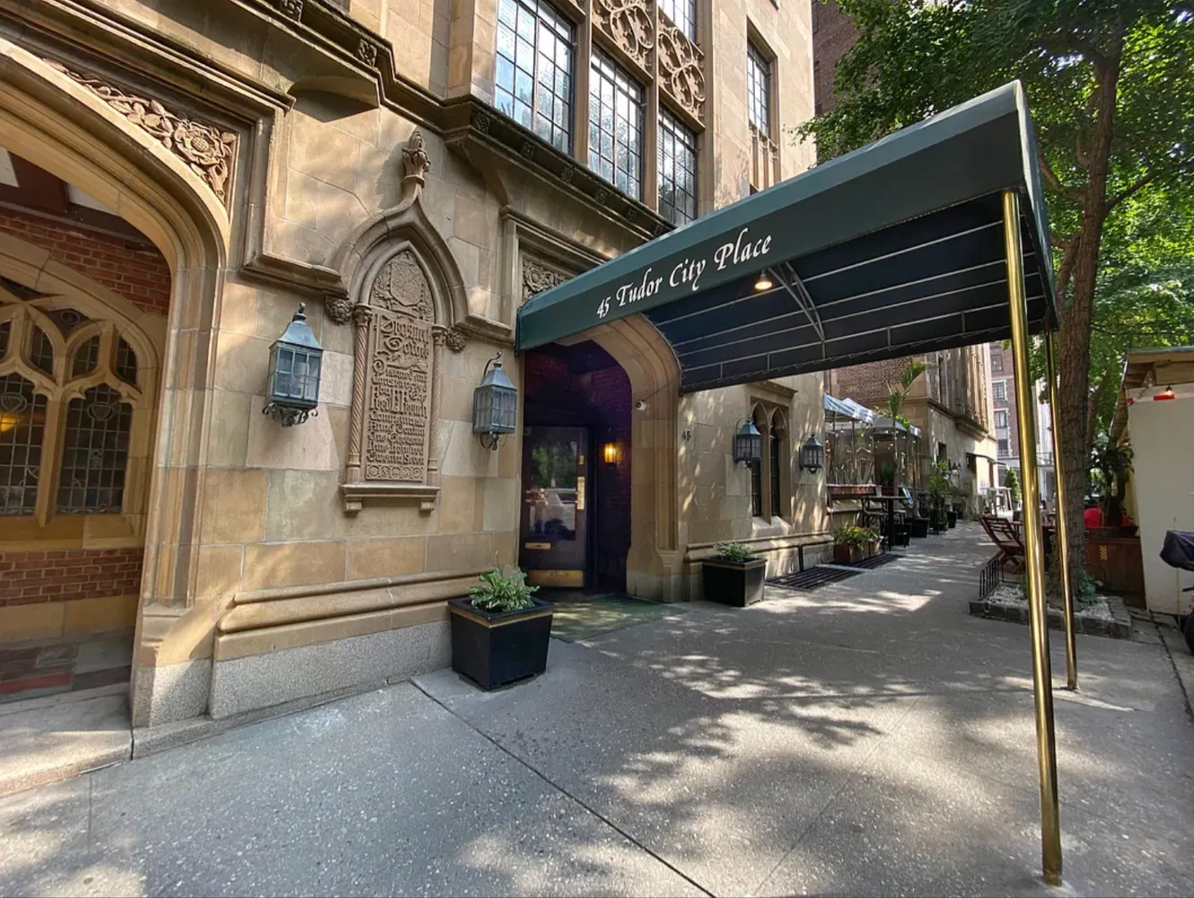 a view of a building with car parked