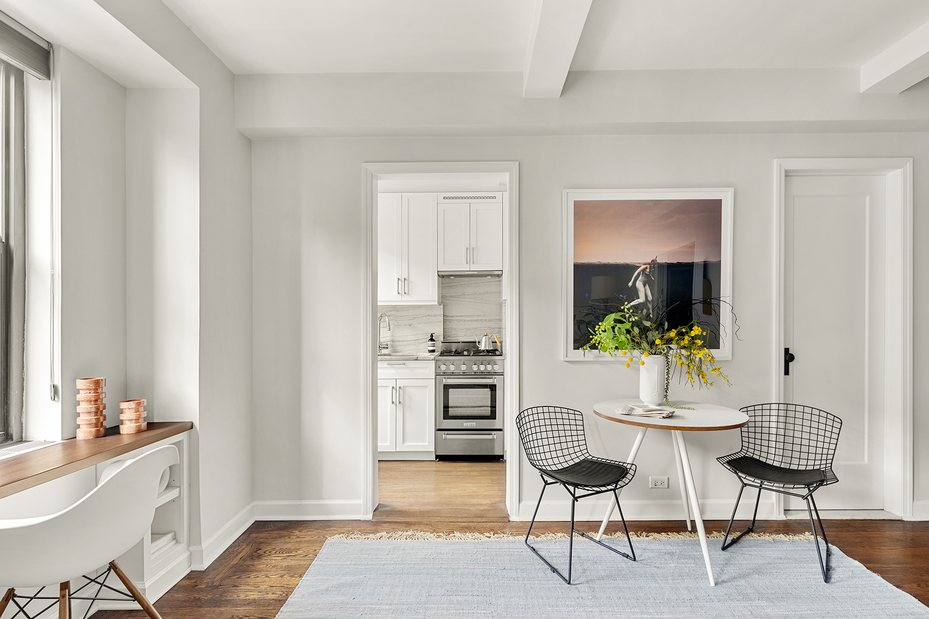 161 West 16th Street, Unit 6E Manhattan, NY 10011 - Photo 2 of 15 a view of a workspace and a kitchen