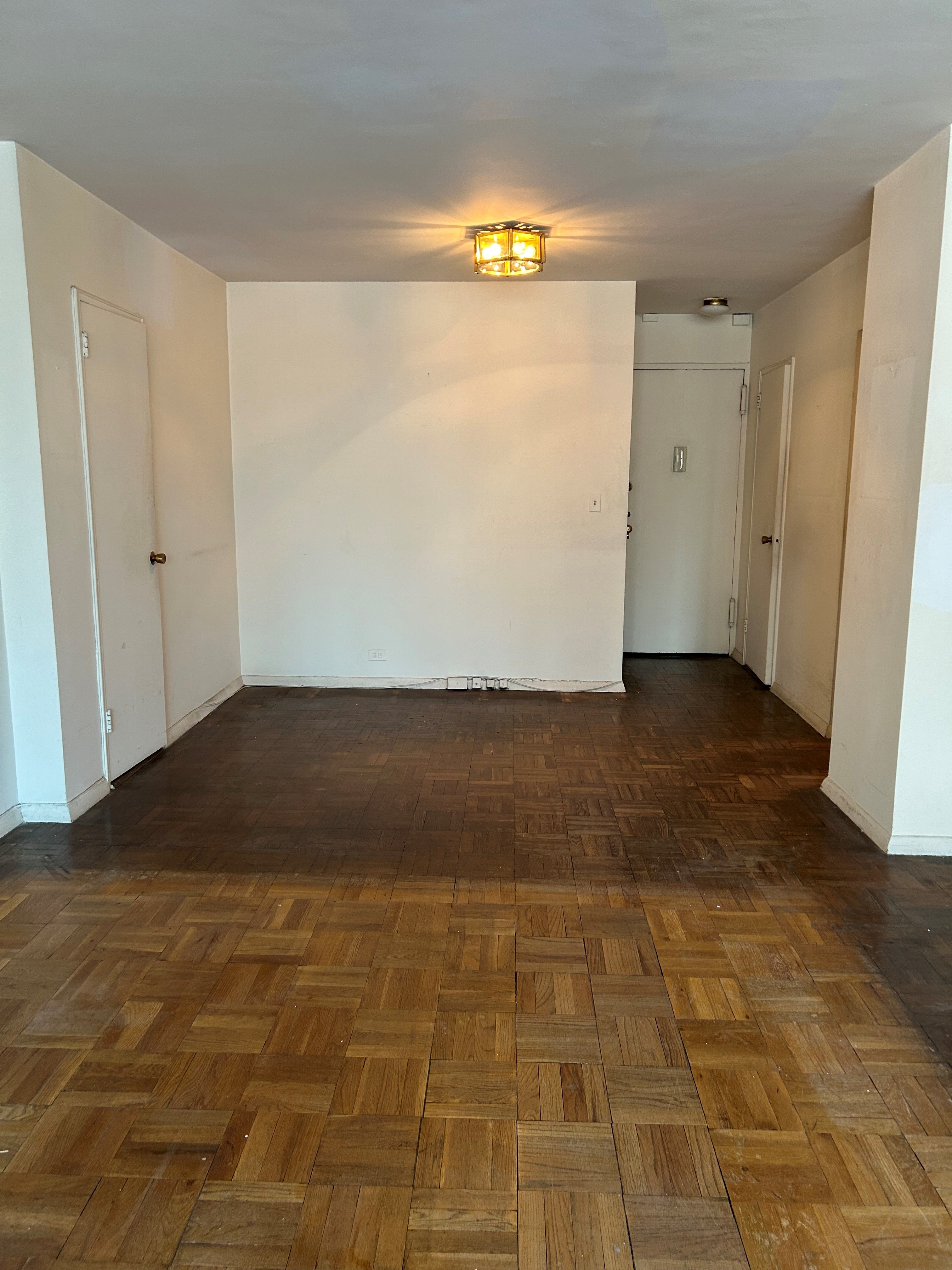 411 East 53rd Street, Unit 11K Manhattan, NY 10022 - Photo 6 of 19 a view of empty room