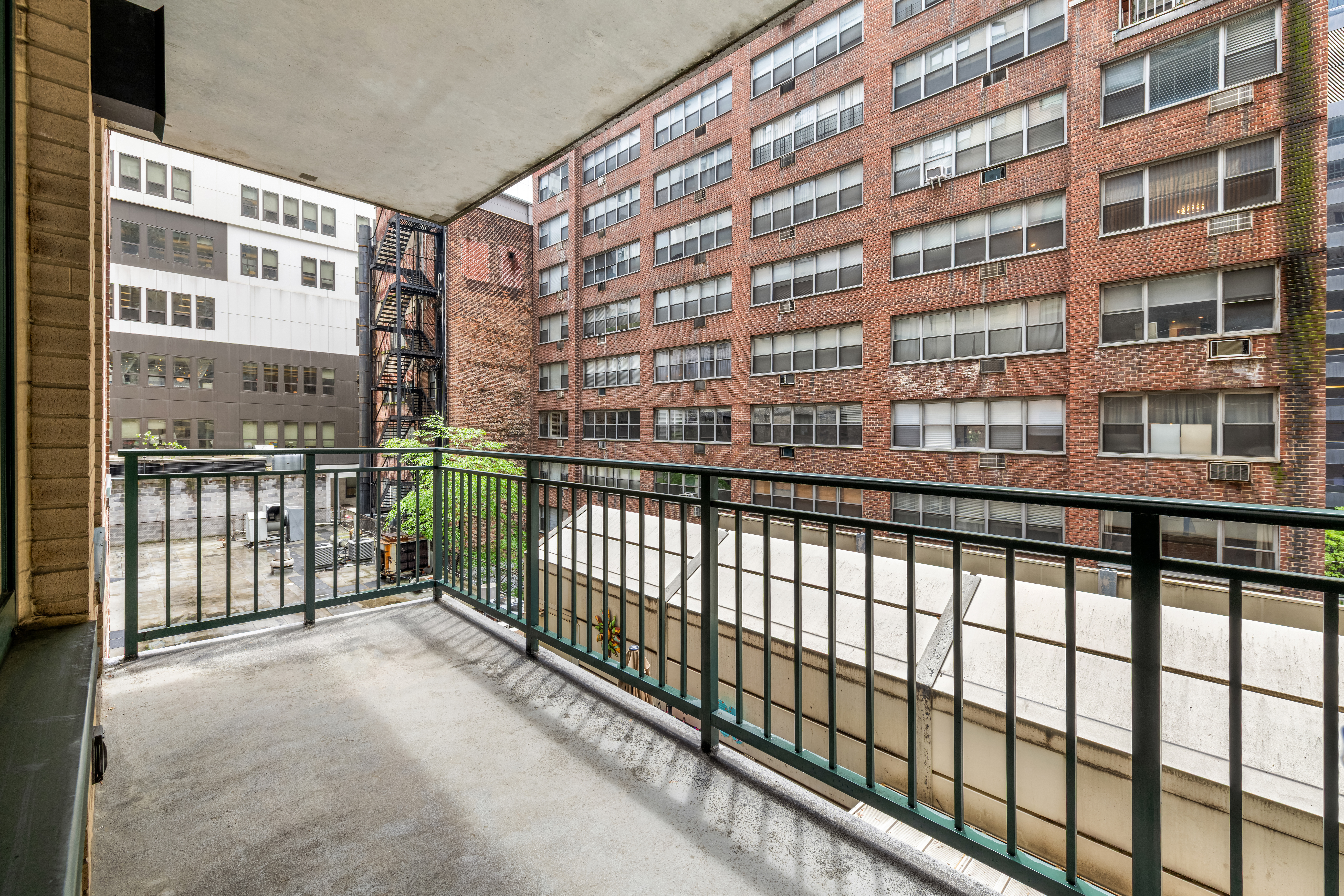 212 East 57th Street, Unit 3B Manhattan, NY 10022 - Photo 6 of 17 a view of a building from a balcony