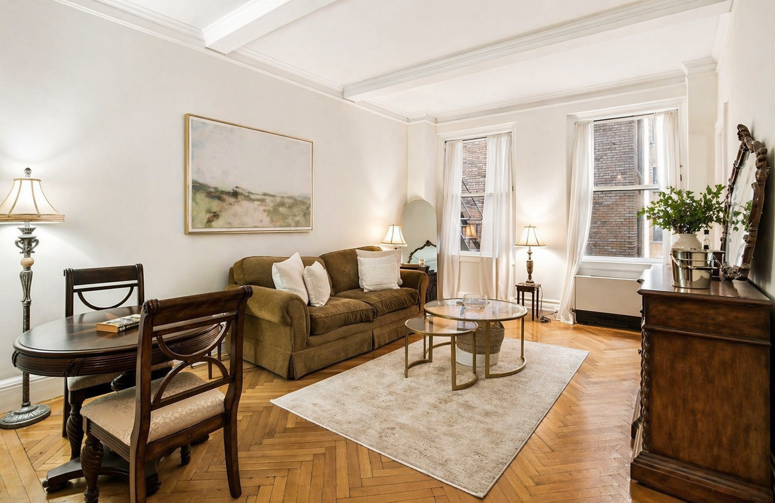 1060 Park Avenue, Unit 3A Manhattan, NY 10128 - Photo 1 of 11 a living room with furniture and wooden floor