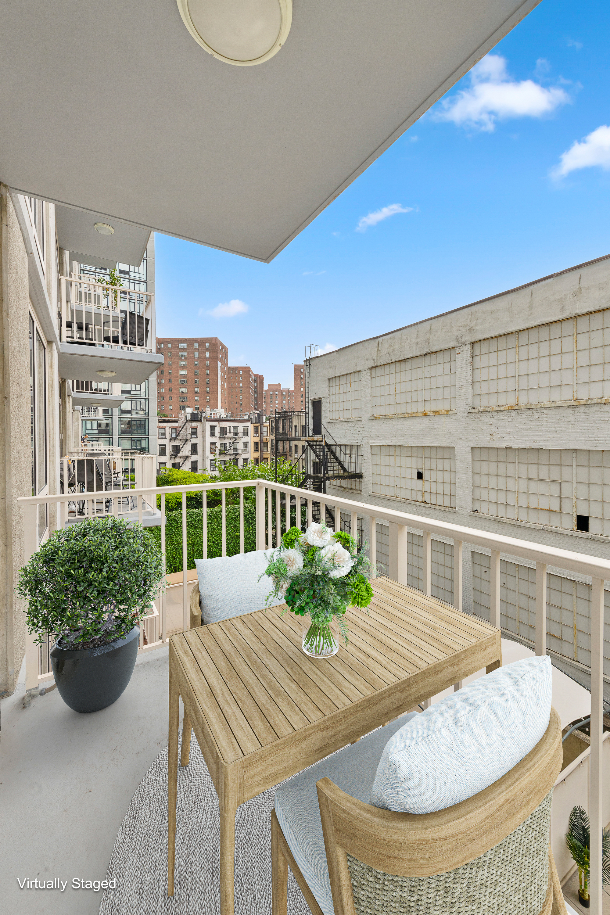 340 East 23rd Street, Unit 4D Manhattan, NY 10010 - Photo 4 of 19 a view of a dining room with furniture window and flowerpot