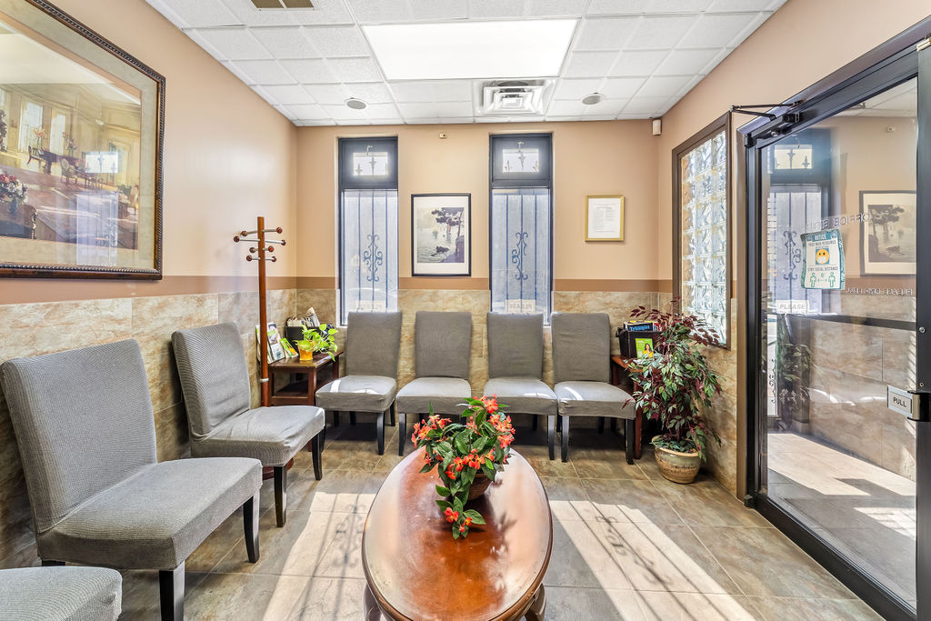 869 Bergen Avenue, Unit COMMERCIAL Jersey City, NJ 07306 - Photo 3 of 26 a living room with furniture and a large window