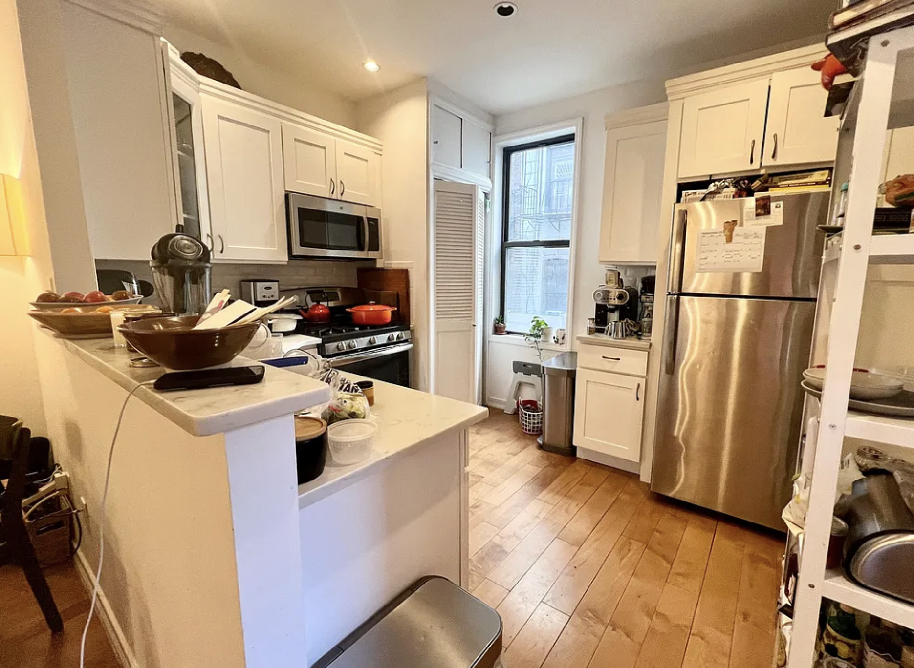 573 6th Street, Unit 3 Brooklyn, NY 11215 - Photo 5 of 19 a kitchen with a sink appliances and cabinets