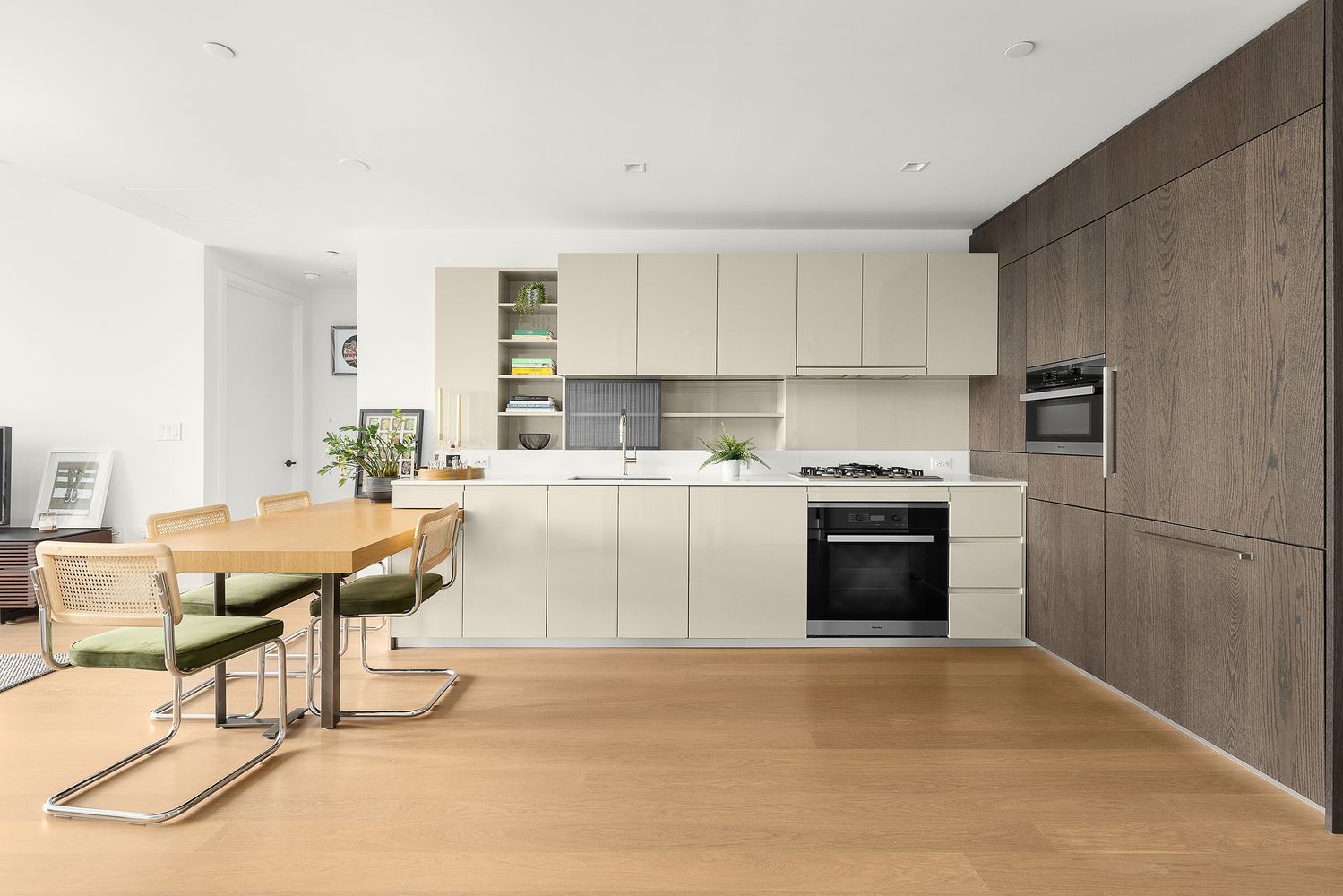 a kitchen with stainless steel appliances kitchen island granite countertop a sink and cabinets